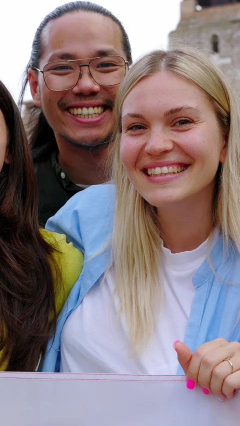 Diverse group of people looking at the camera holding italian flag outdoors Stock Footage 313283771