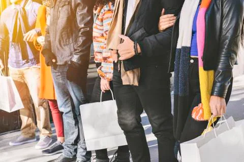 Diverse group of people shop during the holidays - Close Up - Shopping Bags Stock Photos