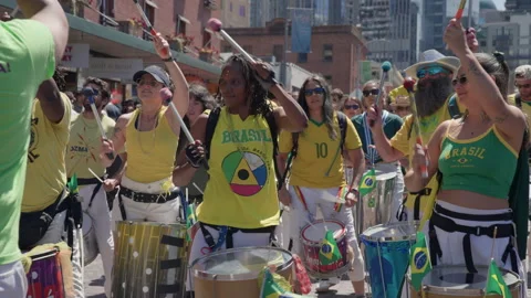 Diverse Group Plays Batucada Drums at Seattle Street Festival Stock Footage 345530261