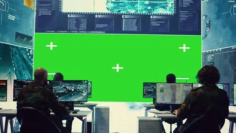 Diverse group of privates operating on a big screen isolated display Foto stock