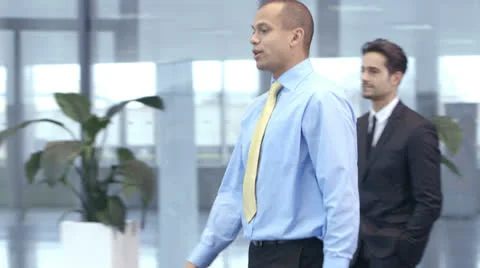 Diverse group of professionals come together for a business meeting Stock Footage 22873880