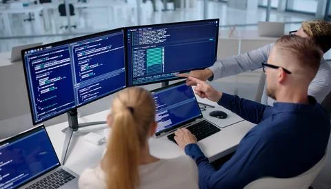 Diverse Group Of Software Engineers Working Together Coding Secure Web Applic Fotos Stock