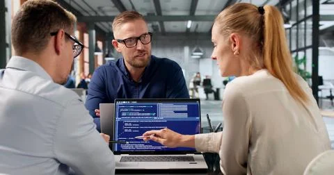 Diverse Group Of Software Engineers Works Together Developing Secure Web Appl 库存照片