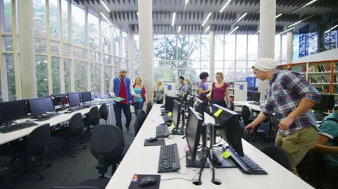 Diverse group of students working together in study area of modern university Vídeo Stock 39459170