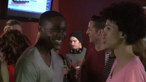A diverse group of young and attractive friends dancing at nightclub Stock Footage 82124643