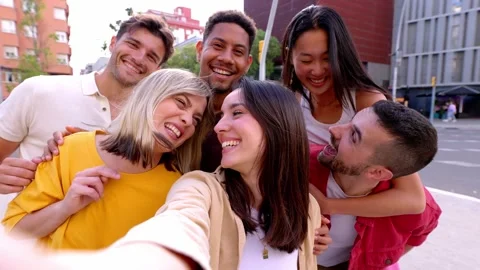 Diverse group of young people having fun taking selfie portrait together outside Stock Footage 251545461