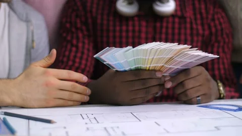 Diverse hands selecting colors from color palette Video stock 101994888