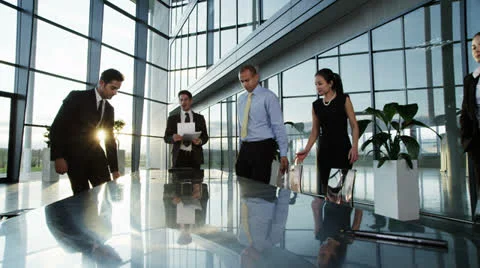  	Diverse, happy business team in a meeting in contemporary office building Stock Footage