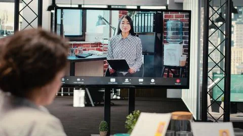 Diverse HR staff hosting a virtual meeting to interview a candidate Stock Photos