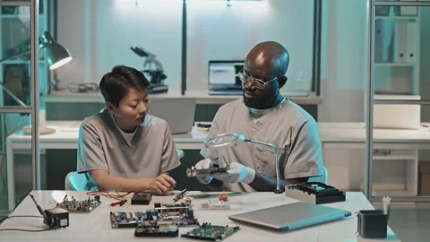 Diverse Lab Workers Discussing Computer Hardware Video stock 170124215