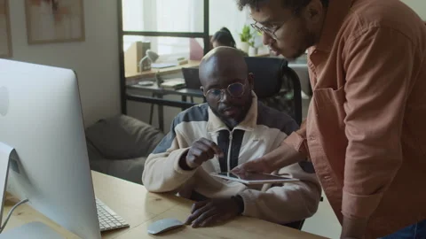 Diverse Male Developer and Tester Running Code on Computer Stock Footage 293123899