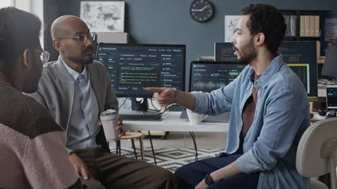 Diverse Male Programmers Discussing Software Development in Office Stock-Footage 337481155