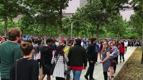 Diverse Masses of Tourists at New York's 9-11 Memorial Park Stock Footage