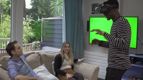Diverse Millenials playing on VR headset Stock Footage 89922084