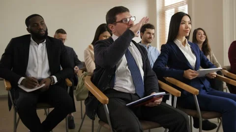 Diverse multi ethnic audience noting at seminar Stock Footage 108008409