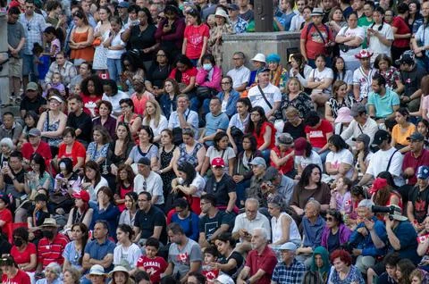 Diverse multicultural crowd watching Canada Day festival in Toronto Stock Photos