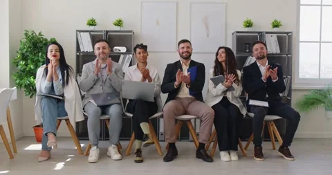 Diverse multiethnic audience clapping hands after presentation at business Stock Footage 337623182