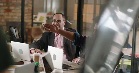 Diverse multiethnic programmers or developers on brainstorming session. Teamwork Stock Footage 158456242