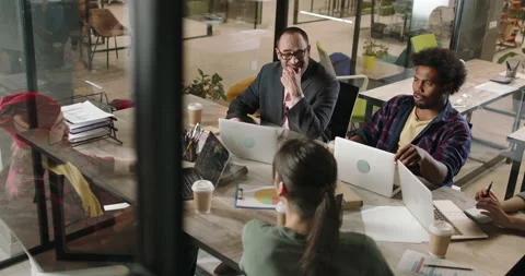 Diverse multiethnic programmers or developers on brainstorming session. Teamwork Stock Footage 160010012