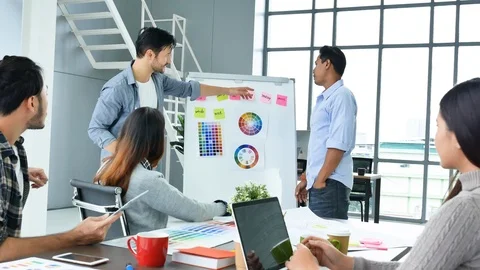 Diverse office team creative agency meeting present design ideas young startup g Video stock 124190508