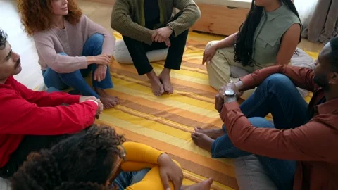 Diverse people participating in a group therapy session Stock Footage 339087456