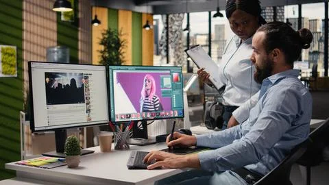 Diverse photographers team, editing software and image selection, photo editor Stock Photos