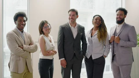 Diverse Professionals Thriving in a Vibrant Modern Office Environment Showcasing Stock Footage 305435997