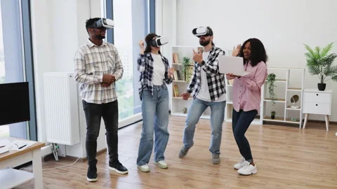 Diverse Professionals Using Virtual Reality Glasses in Modern Office Setting Stock Footage 318384219