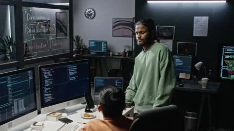 Diverse Programmers Discussing Code on Desktop Computer in Office 스톡 동영상 348372511