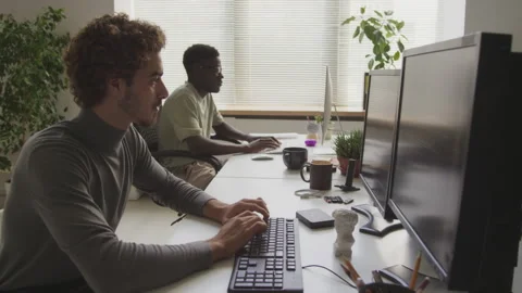Diverse Programmers Working in Office Stock Footage 255781958