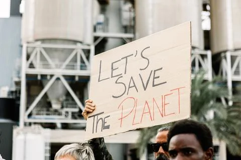 Diverse protestors demonstrating against climate change Stock Photos