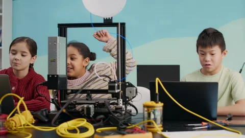Diverse Pupils Studying Robotics and 3D printing in Classroom Stock Footage 304152563