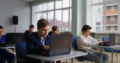 Diverse School Students Boys Learning Programming Language In Coding Classes Stock Footage 280178607