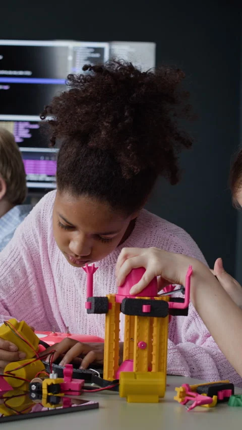 Diverse Schoolchildren Assembling Robot in Stem Robotics Class Stock Footage 339205817