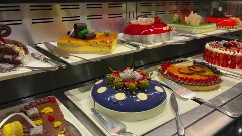 Diverse Selection Of Desserts Presented With Decorative Touches And Inviting 库存影片 337939205