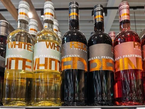 Diverse Selection of Pfaffmann Wine Bottles Displayed on Shelf Stock Photos