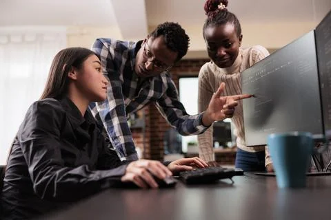 Diverse software developer analyzing html script information Stock Photos