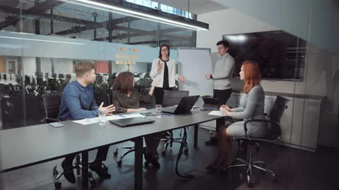 Diverse startup team having discussion during business meeting Stock Footage 147939074