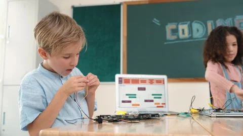 Diverse student working electronic board while laptop display prompt. Pedagogy. Stock Footage 273735728