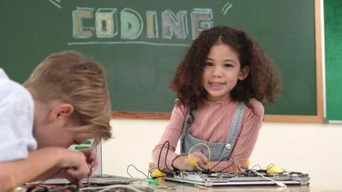 Diverse student working electronic board while laptop display prompt. Pedagogy. Stock Footage 277075937