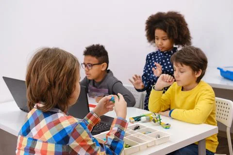 Diverse students in programming school learning to code Stock Photos