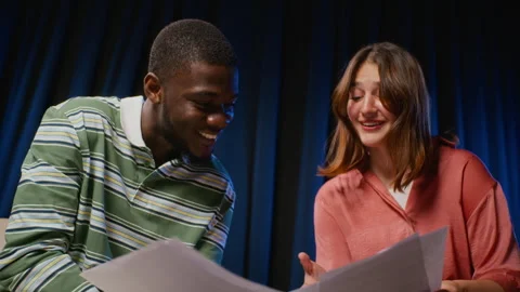 Diverse Students Rehearsing Drama Script on Theater Stage Stock Footage 344522725