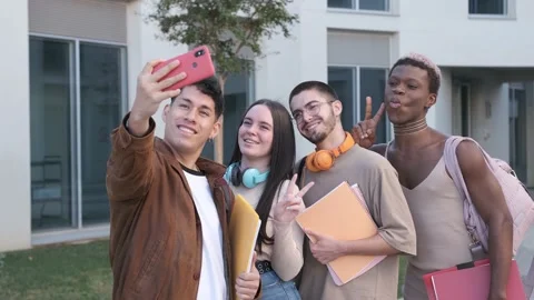Diverse students taking selfie together Stock Footage 234177294