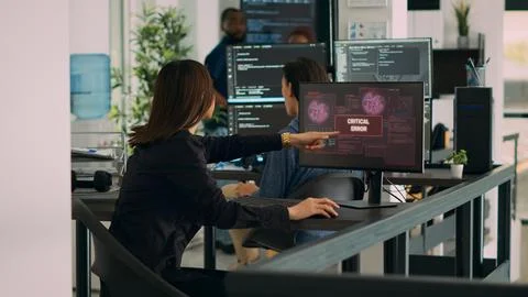 Diverse team of coders having server hacked and system crash 스톡 사진