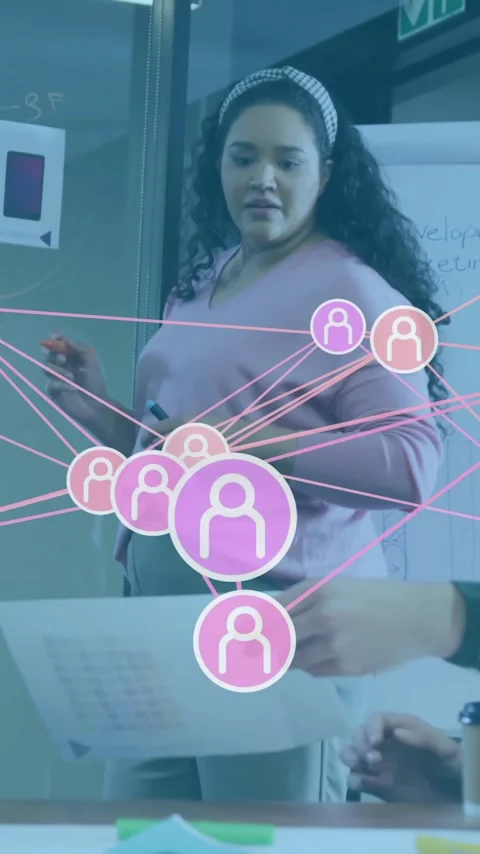 Diverse team collaborating in office with network connections animation overlay Stock Footage 319727119