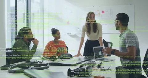 Diverse team collaborating in office with programming code overlay animation Stock Footage 304014148