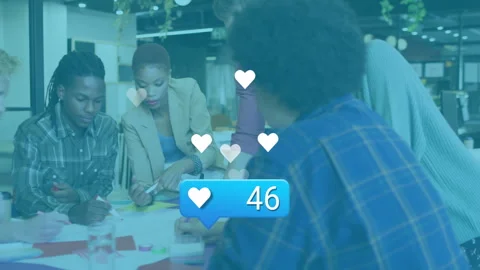 Diverse team collaborating at office with social media likes animation overlay Stock Footage 306240983