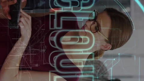 Diverse team collaborating on tablet with cloud computing animation overlay Stock Footage 312510691