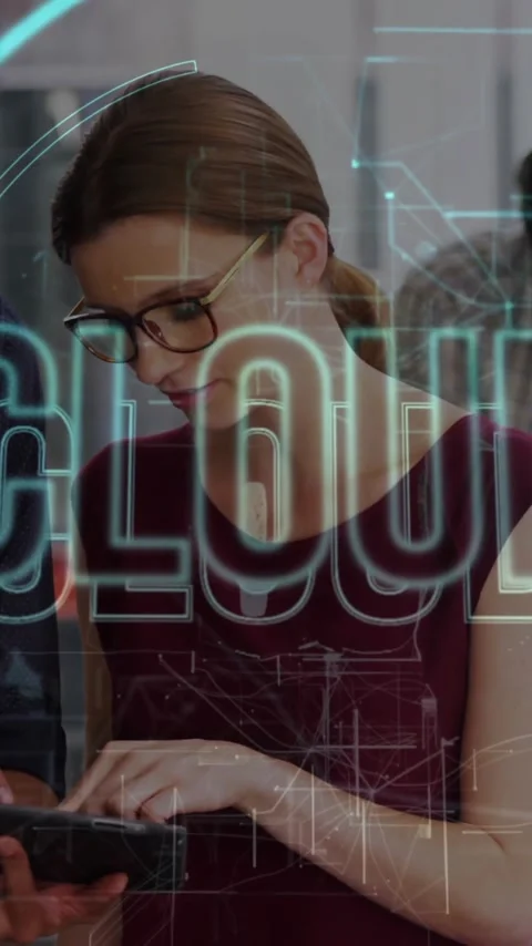 Diverse team collaborating on tablet with cloud computing animation overlay Stock Footage 319728088