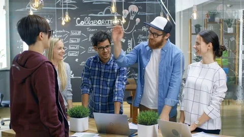 Diverse Team of Creative Developers Make Building Successful Partnership Gesture Stock Footage 84103356